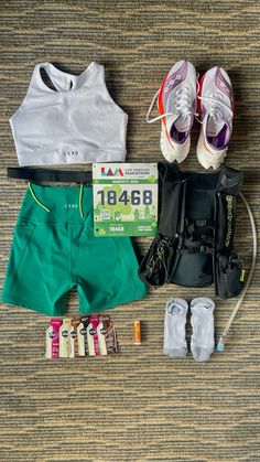 the contents of a running outfit laid out on the floor