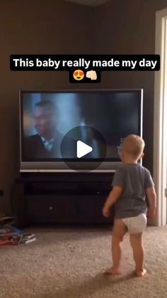 a toddler standing in front of a tv with the caption, this baby really made my day