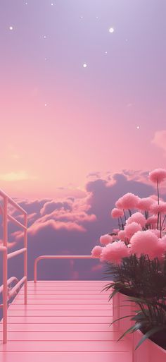 pink flowers and stairs in front of the sky