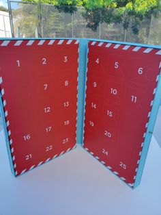 two red and blue boards with numbers on them