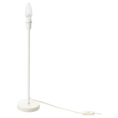 a white electric toothbrush holder on a white background with the cord plugged in