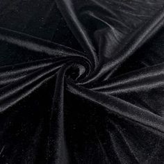 black velvet fabric textured up close to the camera