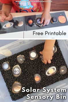 a child playing with solar system sensory bins and free printable for kids