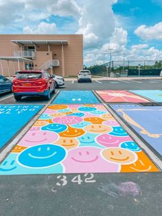 the parking lot is painted with smiley faces