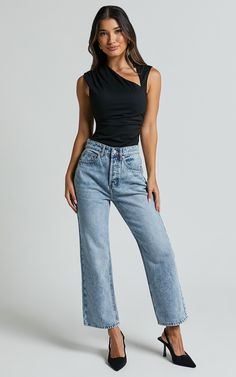 Get ready to rock the denim game in our Wilkins Jeans! With their high-waisted design, straight leg fit, and cropped hem, these jeans are the perfect blend of trendy and timeless. Made from a soft cotton blend with just the right amount of stretch, they offer ultimate comfort without compromising on style. The mid-blue wash adds a cool casual vibe that's perfect for any occasion. Whether you dress them up or down, these jeans will effortlessly take you from day to night in true fashion-forward s Jeans And Bodysuit Outfits, Jeans And Bodysuit, Body Suit Outfits, Hem Jeans, Denim Fabric, High Jeans, Jean Outfits, Wide Leg Jeans, Jeans Style