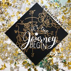 a graduation cap with the words let the journey begin on it surrounded by confetti