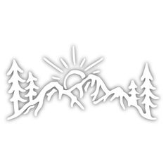 a white paper cutout with trees and mountains in the background