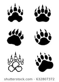 black and white animal paw prints on a white background, set of four different sizes