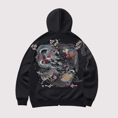 Mythic Creatures, Chic Streets: Rock the Dragon with Our New Hoodie Dive into the depth of tradition and the edge of contemporary style with our Black Japanese Hoodie. A striking emblem of cultural artistry, this hoodie features intricate embroidery that brings to life the fierce beauty of dragons, wrapped in an aura of cherry blossoms and mythical waves. Designed for those who dare to stand out, each dragon is meticulously detailed, symbolizing power, strength, and the moving force of nature, w Mens Embroidery, Mythic Creatures, Japanese Pants, Japanese Hoodie, Japanese Uniform, Sukajan Jacket, Japanese Socks, Dragon Embroidery, Hip Hop Vintage