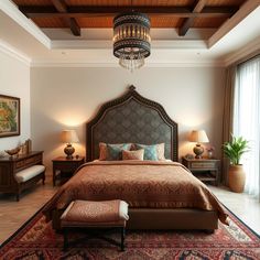 a bedroom with a large bed and chandelier hanging from it's ceiling