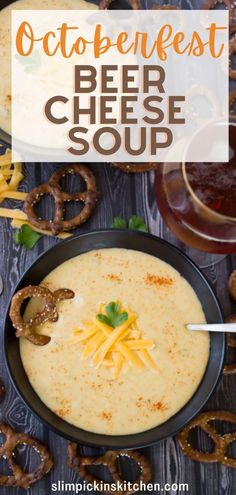 a bowl of beer cheese soup with pretzels on the side