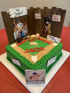 a cake that is shaped like a baseball field with pictures on the front and sides