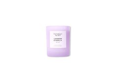 a lavender scented candle on a white background