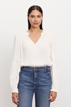 Elegant V-neck Blouse For Layering, Feminine V-neck Tops With Lace Sleeves, V-neck Blouson Sleeve Work Tops, V-neck Lace Top Blouse For Work, Feminine V-neck Top For Workwear, Spring V-neck Lace Top Blouse, Classic V-neck Blouse For Daywear, V-neck Blouse With Lace Trim For Daywear, Chic V-neck Lace Top With Lace Trim