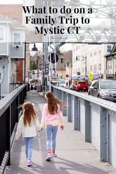 two girls walking down a sidewalk with the words what to do on a family trip to mystic ct