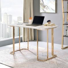 a laptop computer sitting on top of a wooden desk next to a book shelf and window