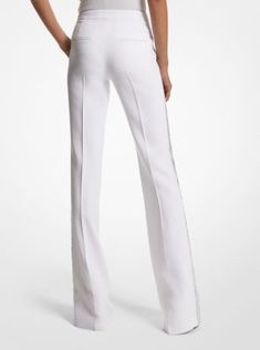 This season’s iteration of our classic Haylee trousers embodies the glamorous aesthetic of Fall/Winter 2023. An embellished stripe runs along the sides of this tuxedo pant for a simple yet striking effect, while the flattering flared leg styles easily with pointed-toe heels. Wear it with the matching blazer. Luxury Fitted White Bottoms, Luxury White Wedding Bottoms, Elegant Embellished White Bottoms, Embellished Fitted Trousers, Fitted Embellished Trousers, Embellished Bottoms For Formal Spring Events, Elegant Embellished Pants For Spring, Chic Fitted Embellished Bottoms, Glamorous Embellished Pants For Formal Occasions