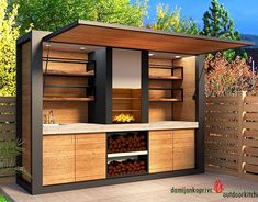 an outdoor bbq with wood cabinets and firewood