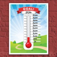 a thermometer on a brick wall with a red ribbon around it that says goal