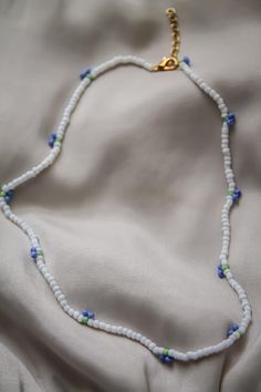 Bring a touch of nature's charm to your style with this stunning blueberry beaded necklace, handmade with care using premium Czech seed beads. Each blueberry is intricately crafted from deep blue beads, creating a vibrant, textured design that mimics the beauty of real berries. The necklace is lightweight and versatile, making it the perfect accessory for both casual wear and special occasions. Blueberry Necklace, Necklace Ideas, Textured Design, Holiday Jewelry, Texture Design, Necklace Handmade, Blue Beads, Costume Ideas, Deep Blue