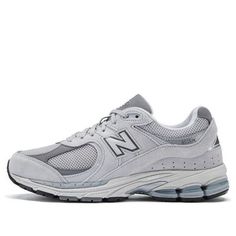 The New Balance 2002R 'Grey' is a classic silhouette that bridges the past and the future. Featuring an upgraded N-ERGY cushioning material in the ABZORB midsole, this sneaker is equipped with a soft leather upper and a classic mesh for a modern twist. Whether you're running, walking, or just looking for a stylish shoe, the 2002R 'Grey' is the perfect choice. Inspired by the original 2002R, this shoe is a timeless classic that will never go out of style. (SNKR/Retro/Unisex/Low Top) Classic Gray New Balance Sneakers, Classic Gray Sports Sneakers, Classic Gray Sneakers For Sports, Classic Gray Breathable Sneakers, New Balance 2002r, Stylish Shoes, Classic Silhouette, Shoes Fashion, Go Out