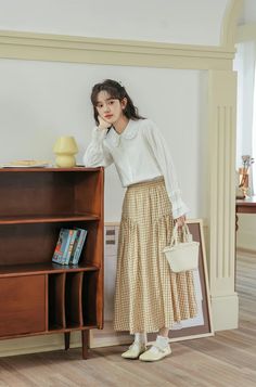 Linen blend gingham skirt with an elasticised waist, scalloped hip pattern and twirly midi hem. Lined. One Size: 24"-36" waist, 30" length Gingham Skirt, Overall Dress, Sweater Blouse, Cardigan Jacket, Linen Blend, Jeans Pants, Gingham, Sweaters & Cardigans, Midi Skirt