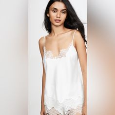 Simone Perele Eclipse Pj Set, New, Size Sfirm Price Shorts+Tank Top Have Not Been Worn But The Tags Are Off. Yeh Color Is Ivory But Not Too Yellow, True To Size, 75% Poly, 25% Polyamide, Lace Trip, Not Too Sheer. White Camisole With Delicate Straps For Loungewear, Chic White Tank Top For Loungewear, White Cami Sleepwear Camisole, White Lace Trim Top For Wedding Night, Chic White Camisole For Daywear, Elegant White Tank Top For Loungewear, Feminine Tops For Wedding Night In Spring, Chic White Sleep Tops, Feminine Spring Wedding Night Tops