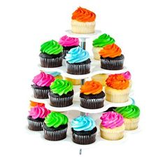 cupcakes are arranged in the shape of a pyramid on a white background photo