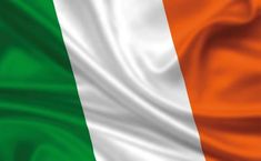 the flag of ireland is waving in the wind