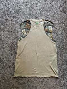 swaggy vintage camo. reach out with any questions. this item is pre owned vintage. please reach out with any questions and view all photos for details on condition. happy to send additional photos and measurements upon request.  thanks for viewing! -Purple Steez Vintage Affordable Camouflage Sleeveless Tank Top, Casual Camouflage Sleeveless Top, Sleeveless Camouflage Cotton Top, Midwest Princess, Camo Shirt, Camo Shirts, Shirt Y2k, Muscle Tee, Cool Vintage