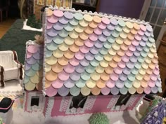 a doll house made to look like a fish scale