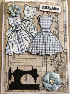 a card with two dresses and a sewing machine on the front, one is made out of paper