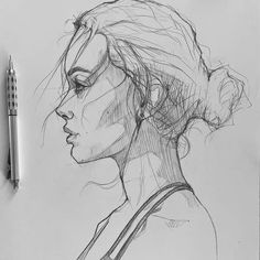 a pencil drawing of a woman's profile