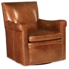 a brown leather chair with studding on the armrests and foot rests against a white background