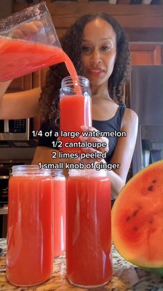 a woman pouring watermelon juice into two jars