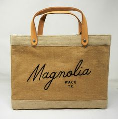 Magnolia Script Market Tote Bag This is a brand new bag with original tags attached. This tote is perfect for shopping, picnics, or grocery trips. It features premium leather handles for easy carry, script logo, and burlap construction that's sturdy enough to hold just about anything.  It also features an inside pocket. Order Processing We only process orders that are paid in full. We process and ship orders Monday - Friday 9AM - 3PM Central Standard Time. Orders place after hours, weekends or h Brown Shopping Bags With Reinforced Handles, Rectangular Burlap Shopping Bags, Rectangular Burlap Bags For Shopping, Travel Rectangular Shoulder Bag With Signature Hardware, Rectangular Travel Shoulder Bag With Signature Hardware, Burlap Tote Bag With Leather Handles, Everyday Burlap Tote Bag, Burlap Tote Shoulder Bag For Travel, Daily Burlap Bags With Leather Handles