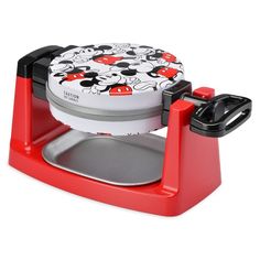 the mickey mouse waffle maker is red and white