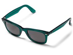 Ray-Ban 50 mm 0RB2140 Wayfarer - Fashion Sunglasses : Transparent Green/Dark Grey : Lightweight and sleek, the Ray-Ban 50 mm 0RB2140 Wayfarer Sunglasses offer you that desired comfort while protecting your eyes on those bright and sunny days. Modern rectangular shape frame made of plastic. Polarized gradient lenses with 100% UV protection. Polished logo hardware on the temples. Integrated nose guards. Comes in a protective leather case. Made in Italy. Measurements: Eye Size: 50 mm. Bridge: 22 mm Green Wayfarer Sunglasses With Gradient Lenses, Green Wayfarer Sunglasses With Tinted Lenses, Green Wayfarer Sunglasses With Mirrored Lenses, Green Polycarbonate Sunglasses With Gradient Lenses, Green Sunglasses With Gradient Lenses In Polycarbonate, Green Gradient Sunglasses In Polycarbonate, Green Sunglasses With Gradient Lenses, Wayfarer Sunglasses With Uva Protection, Sunglasses Transparent