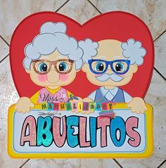 an image of two people holding a sign that says abuelito's on it