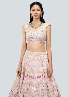 Baby pink embellished heavy kali plastic mirror work raw silk lehenga with broad border lehenga, sleeveless blouse and cutwork border dupatta. Pink Choli With Mirror Work For Navratri, Pink Kundan Choli With Mirror Work, Pink Sleeveless Lehenga With Resham Embroidery, Sleeveless Pink Lehenga With Resham Embroidery, Lehenga Sleeveless, Pink Sleeveless Choli With Resham Embroidery, Sleeveless Pink Choli With Resham Embroidery, Pink Fitted Lehenga With Unstitched Blouse, Embellished Pink Sets For Navratri