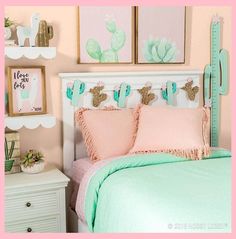 a bedroom with pink walls and mint green bedding, cactus prints on the wall