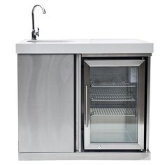 a stainless steel refrigerator and sink with glass doors