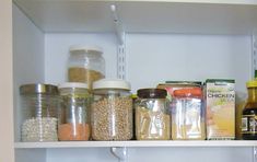 the shelves are filled with various types of food and condiments, including rice