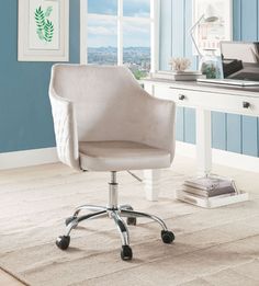 a white desk chair sitting on top of a wooden floor