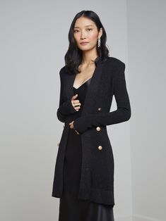 An effortlessly chic double-breasted cardigan in pure black with shimmering metallic. Slim-fit long-line design flatteringly tapers from strong shoulder to waist before falling to mid-thigh. Detailed with luxe gold embossed-dome accent buttons. Wrap-tie closure with detachable tie belt. Dark Feminine Era, Double Breasted Cardigan, Kibbe Dramatic, Outfit Style Ideas, Feminine Era, Strong Shoulders, Knit Denim, Wedding Black, Winter Capsule