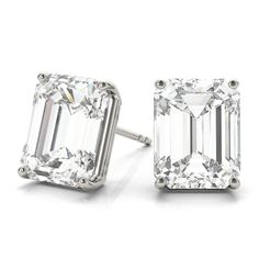 Glowing Moissanites set in a prong setting form these contemporary Moissanite stud earrings. Showcased in these beautiful earrings are 2 excellent cut F-G VVS1 Emerald Moissanites. These four-prong basket Moissanite earrings are built in 14kt white gold. Available as screw backs or push backs, these single-stone Moissanite earrings have a 1 1/2 carat total weight. Proudly made in USA, these studs are available in other metals, and carat weights. #earrring #earrringsbijoux #earringshopping Emerald Cut Diamond Earrings, Emerald Diamond Earrings, Emerald Cut Moissanite, Simple Stud Earrings, Emerald Cut Diamond, Moissanite Earrings, Diamond Stud Earrings, Diamond Stud, Emerald Cut Diamonds