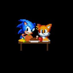 two sonic and tails sitting at a table