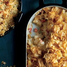 a casserole dish filled with macaroni and cheese next to a skillet