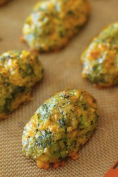 broccoli patties on a baking sheet ready to be baked in the oven