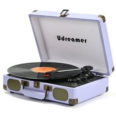 an open suitcase with a record player in it